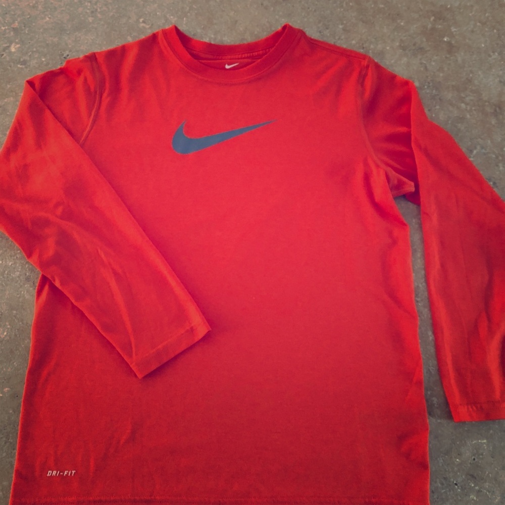 Boys size large orange long sleeve Nike shirt